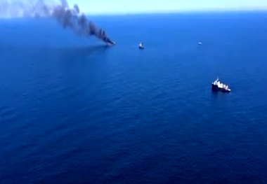 Evergreen vessel rescues crew from burning fishing boat