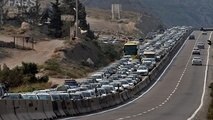 ترافیک سنگین در آزادراه قزوین_کرج_تهران/بارش برف و باران در محورهای مواصلاتی ۸ استان کشور 