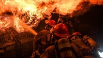 Fire on coastal oil tanker off Singapore